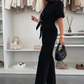 Dames-jumpsuit met knoopsluiting en strikceintuur in de taille