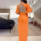Rugloze midi jurk met split en uitsnijding aan de taille