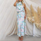 Love In The Garden Bloemenprint Maxi-jurk met halterhals en elastieken taille.