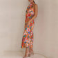 Love In The Garden Bloemenprint Maxi-jurk met halterhals en elastieken taille.