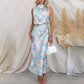Love In The Garden Bloemenprint Maxi-jurk met halterhals en elastieken taille.