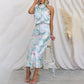 Love In The Garden Bloemenprint Maxi-jurk met halterhals en elastieken taille.