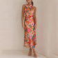 Love In The Garden Bloemenprint Maxi-jurk met halterhals en elastieken taille.