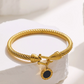 Vintage-geïnspireerde Fijne Armband met Spiraalstructuur en Hoefijzersluiting