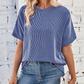 Het gezellige geribbelde oversized T-shirt van vrouwen