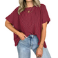 Het gezellige geribbelde oversized T-shirt van vrouwen