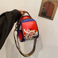 Dames schoudertas met modieuze print