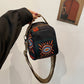 Dames schoudertas met modieuze print
