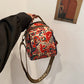 Dames schoudertas met modieuze print