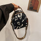 Dames schoudertas met modieuze print