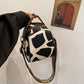 Dames schoudertas met modieuze print