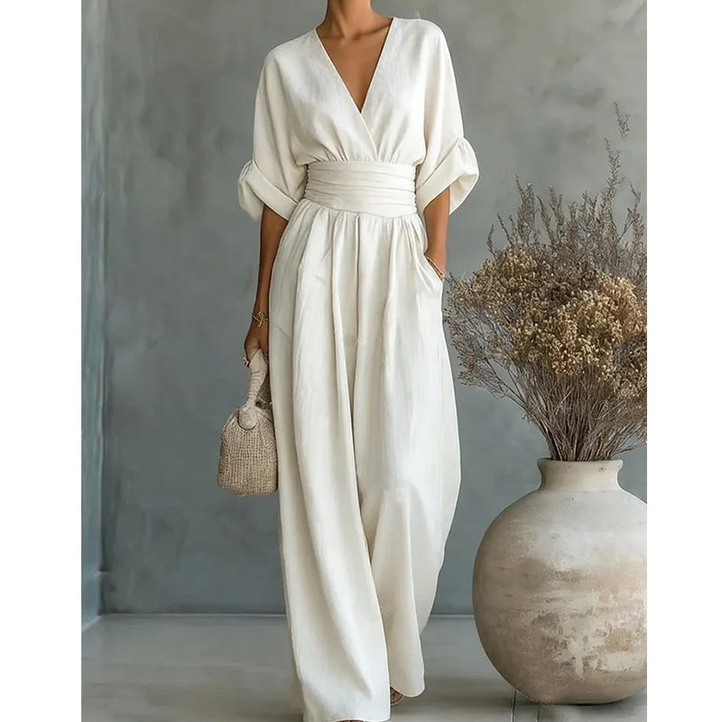 👗 50% OFF NOW! ✨ Elegant V-Neck Wide-Leg Jumpsuit – Flattering Waist Sash, Soft Breathable Fabric & Relaxed Fit 🦋