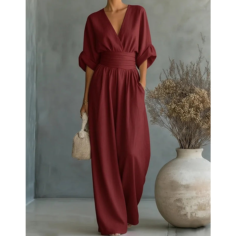 👗 50% OFF NOW! ✨ Elegant V-Neck Wide-Leg Jumpsuit – Flattering Waist Sash, Soft Breathable Fabric & Relaxed Fit 🦋